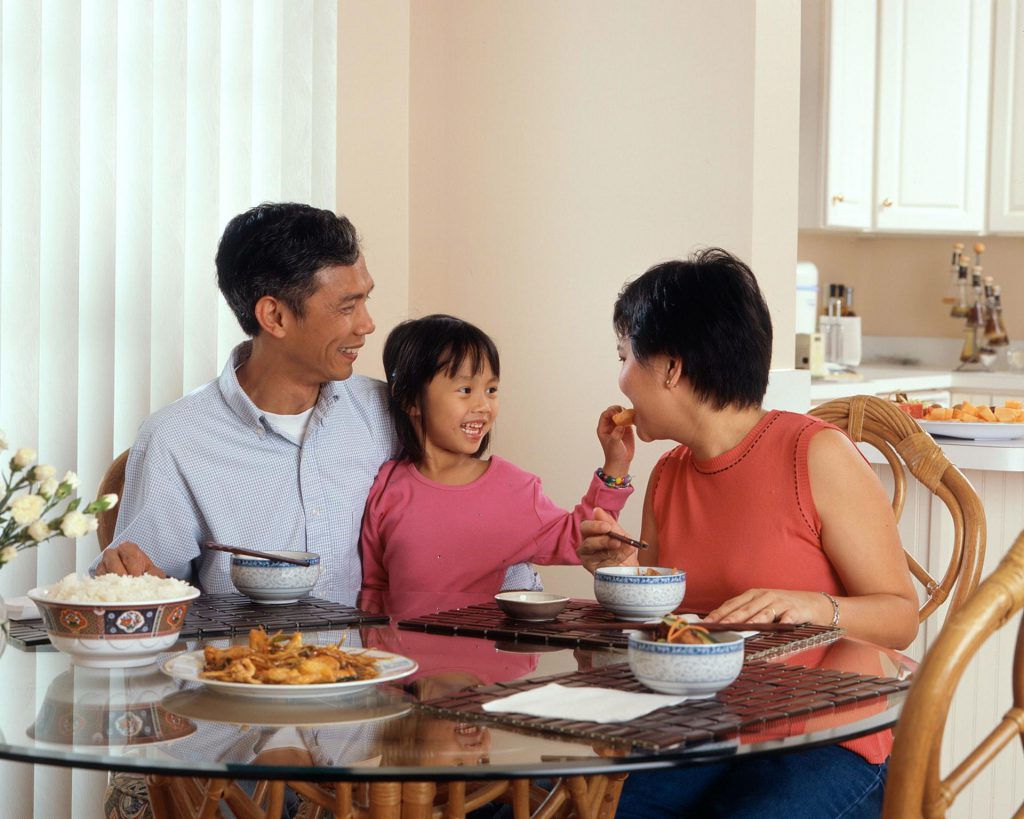 family eating healthy food at home